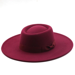 Detail of burgundy wool felt fedora with 9.5cm wide brim and matching grosgrain ribbon bow