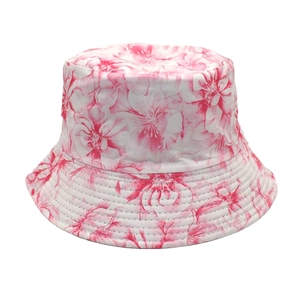 Close-up of floral print pattern and reinforced stitching on the pink cotton bucket hat