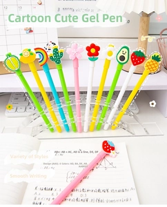 Detailed view of 10 cartoon neutral pens with silicone toppers on an acrylic desk organizer