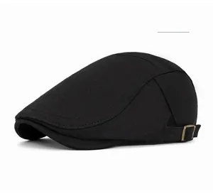 Detailed view of black ivy cap fabric texture and adjustable vintage metal buckle