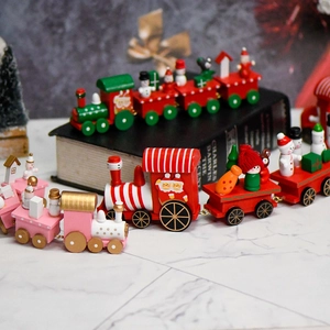 Handcrafted wooden Christmas train ornament with Santa and snowman figures for festive decor