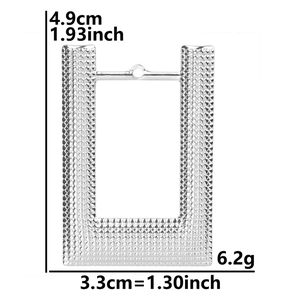 Detailed view of silver rectangular pendant with textured finish and precise dimensions