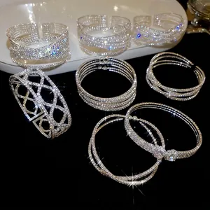 Set of minimalist silver-colored sparkling pearl and rhinestone layered cuff bracelets