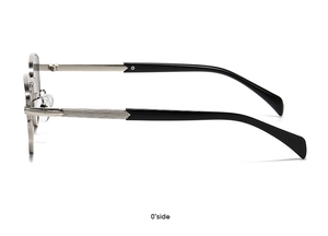 Detail view of silver metal eyeglass frame with side stripes and black temples