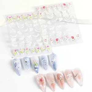 Macro detail of 5D embossed nail stickers featuring elegant roses and tulips patterns