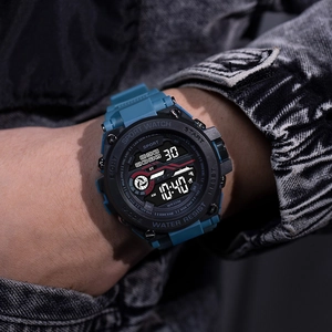 Blue strap digital sports watch with night light and water resistance shown on a wrist