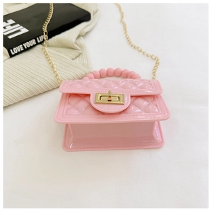 Pink PVC jelly bag with quilted pattern, pearl handle, and golden metal chain strap