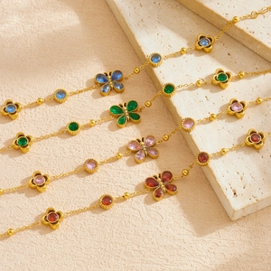 Elegant gold plated stainless steel bracelet with colorful crystal butterfly and flower charms
