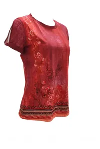 Close-up of the vintage floral print and fabric texture on a red short sleeve t-shirt