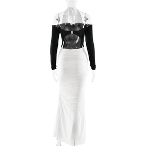 Detail showing backless cut-out with metal buckle and ruched white skirt of a long dress