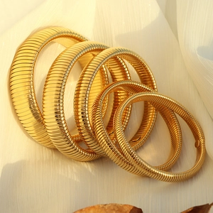 Golden vintage style Tubogas snake bone elastic bracelets in five different thicknesses