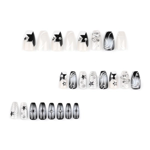 Y2K long coffin press-on nails with black and white star pattern and crystal 3D gems