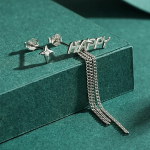 Elegant S925 sterling silver asymmetrical earrings with star and HAPPY tassel design