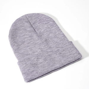 Close-up of soft purple-grey knit beanie with classic cuffed design for winter warmth