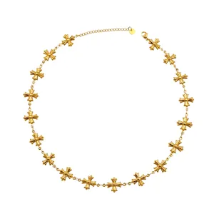 Byzantine style stainless steel cross necklace with gold finish for a modern statement look