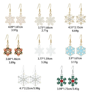 Detailed grid view of assorted rhinestone snowflake earrings with size and weight specs