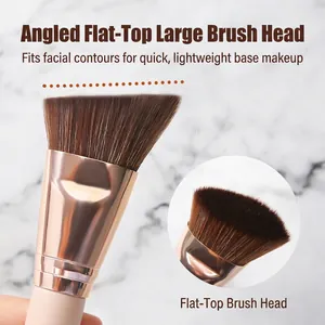Angled flat foundation brush with dense synthetic bristles and rose gold metallic ferrule