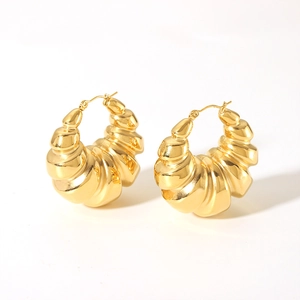 Detailed view of 18K gold plated hollow twist hoop earrings with croissant texture