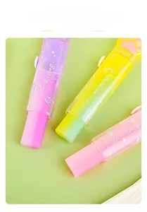 Detail of cat paw push-pull erasers in pastel gradient colors with transparent cases