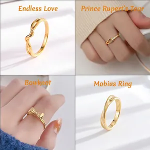 Set of four gold stainless steel rings featuring bow and infinity designs for women