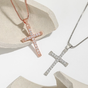 Hip hop style cross pendant necklaces in rose gold and silver with pave-set cubic zirconia