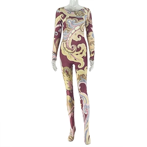 Macro detail of the paisley printed long sleeve bodysuit featuring stretchy fabric