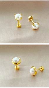 Detailed view of gold pearl screw-back earrings with prong and bezel setting options