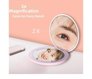 Pink foldable LED travel mirror with 1X/2X magnification dual side lighting