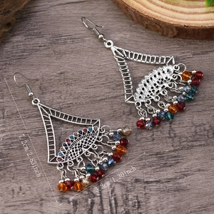 Detailed dimensions of ethnic bell tassel earrings showing length and width measurements