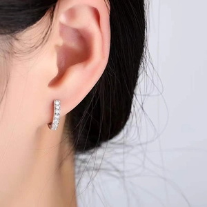 Sparkling single row diamond-set silver hoop earrings for a sophisticated look
