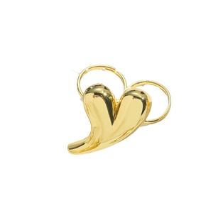 Polished gold abstract heart-shaped open ring with sleek metallic finish on white background