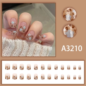 Faux ongles courts french avec motif léopard marron et fleurs bleues lot de 24