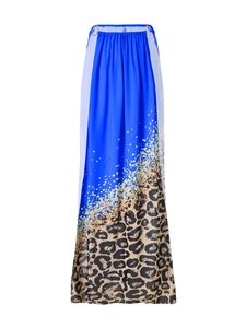 Detail of royal blue beach skirt with leopard print and gold metal ring accents