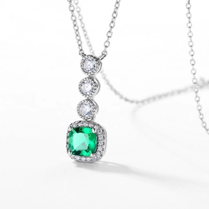 Elegant S925 silver necklace with green emerald cut gemstone pendant and tiny diamonds
