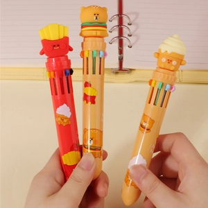 Close-up of hands holding cute cartoon multi-color pens with animal charms on top