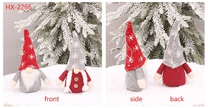 Front, side, and back views of red and gray knitted Christmas gnome dolls with snowflakes