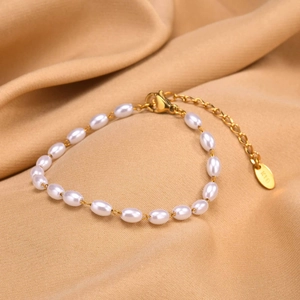 Women's 18K gold plated stainless steel pearl bracelet with lobster clasp and K18 tag