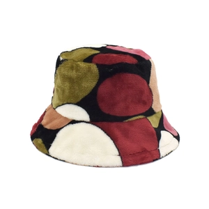 Winter plush bucket hat with thick coral fleece and geometric patchwork color block design