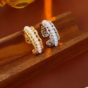 Adjustable hollow carved pearl open rings in gold and silver finish for women