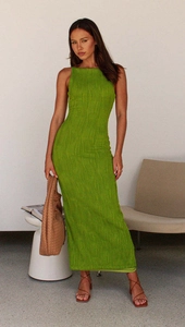 Detail of green backless sleeveless bodycon dress with textured water-ripple fabric finish