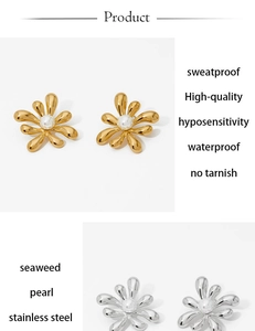 Detail of waterproof stainless steel flower earrings with pearl in gold and silver