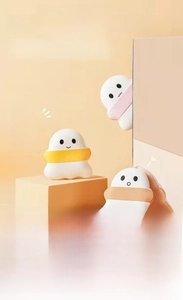 Macro detail of ghost-shaped marshmallow makeup sponges with soft air-cushion texture