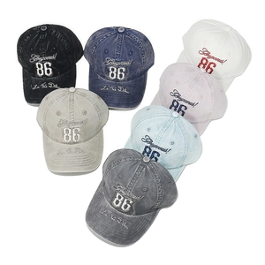 Detailed view of colorful washed cotton baseball caps with Gorgeous 86 embroidery