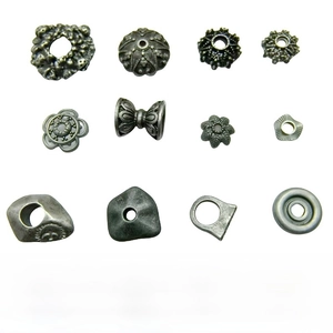 Detailed collection of vintage flower bead spacers in antique silver alloy for DIY jewelry