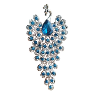 Silver peacock brooch with blue waterdrop crystal and sparkling rhinestone feathers