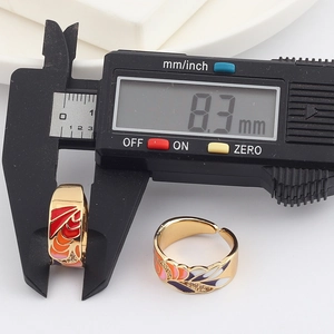Detail showing an 8.3mm width measurement of the colorful enamel gold plated ring