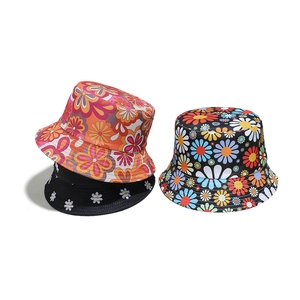 Chic floral daisy print bucket hats for sun protection in vintage and bohemian styles