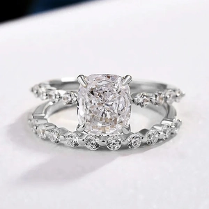Square cushion cut engagement ring set with matching pave band in silver finish