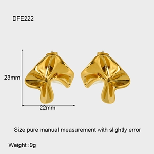 Detailed view of 18k gold plated irregular hammered earrings with 23mm dimensions