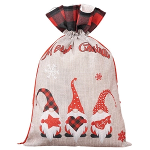 Linen Christmas gift bag with plaid trim and three cute gnomes with Merry Christmas text